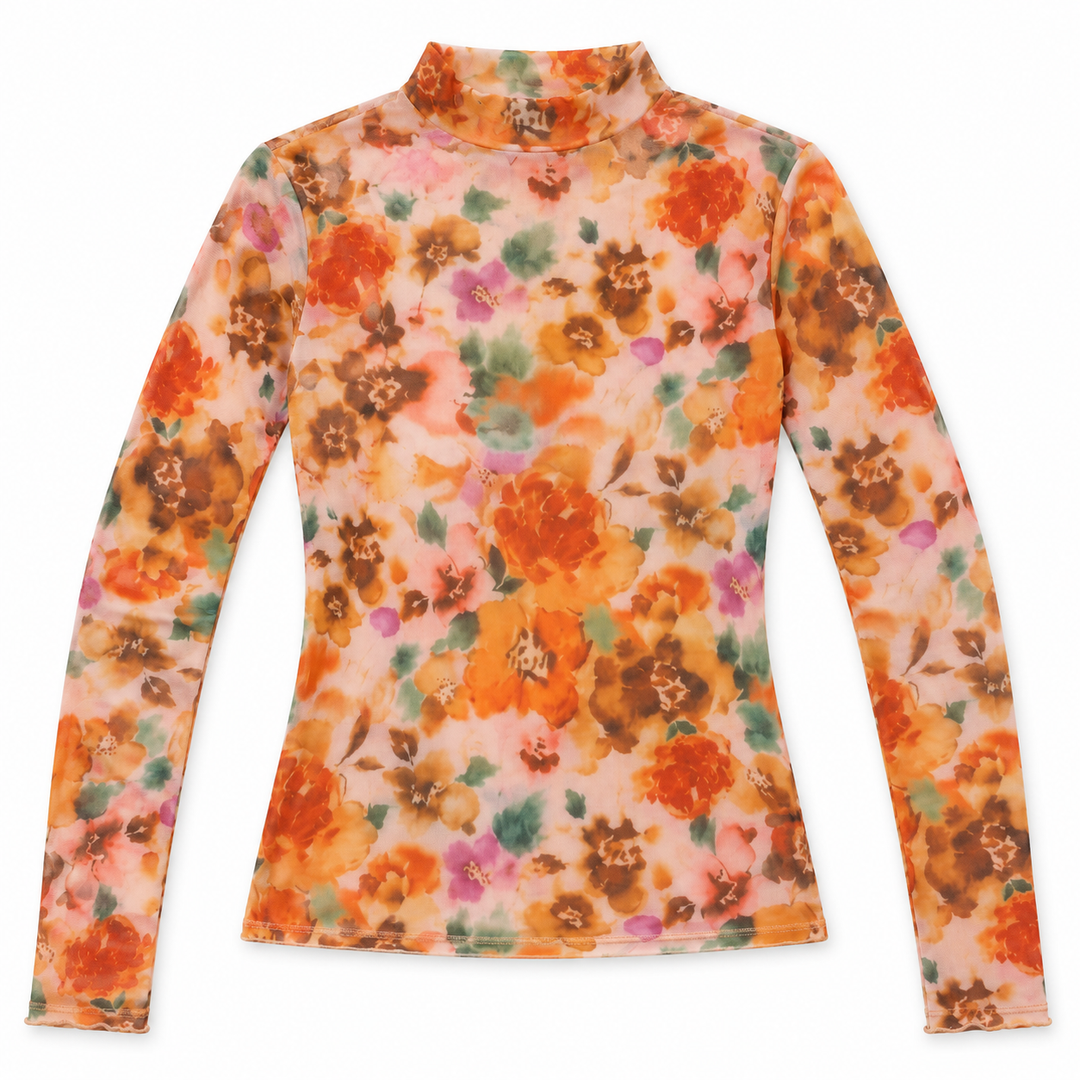 A long-sleeve mock neck top with a vibrant orange, pink, and green floral watercolor pattern on a light peach background, shown flat against a white background.