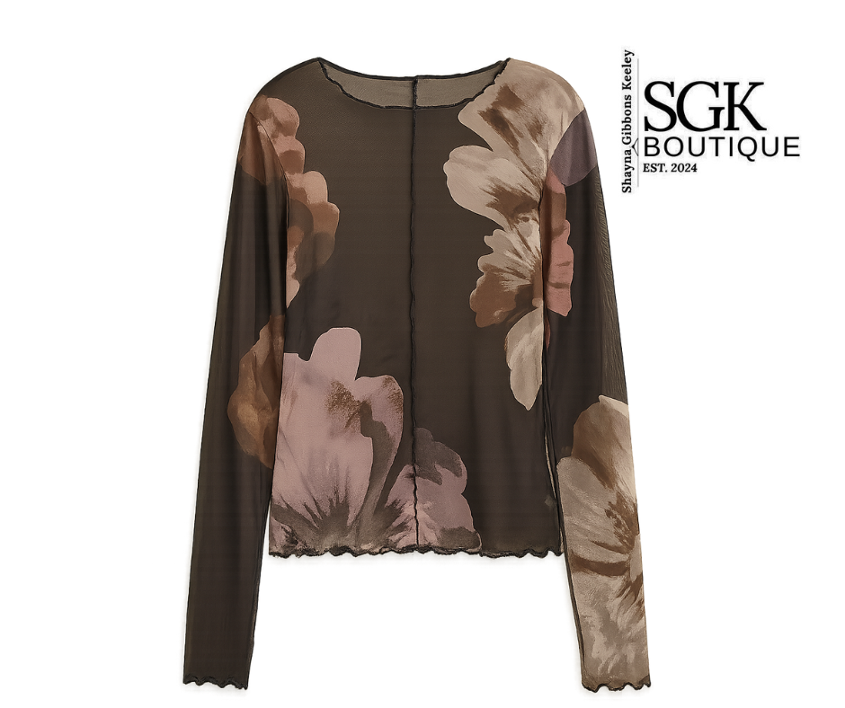 Floral patterned top with long sleeves on a white background, featuring the SGK Boutique logo.