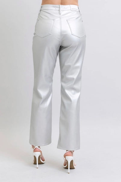 Silver metallic pants on a white background