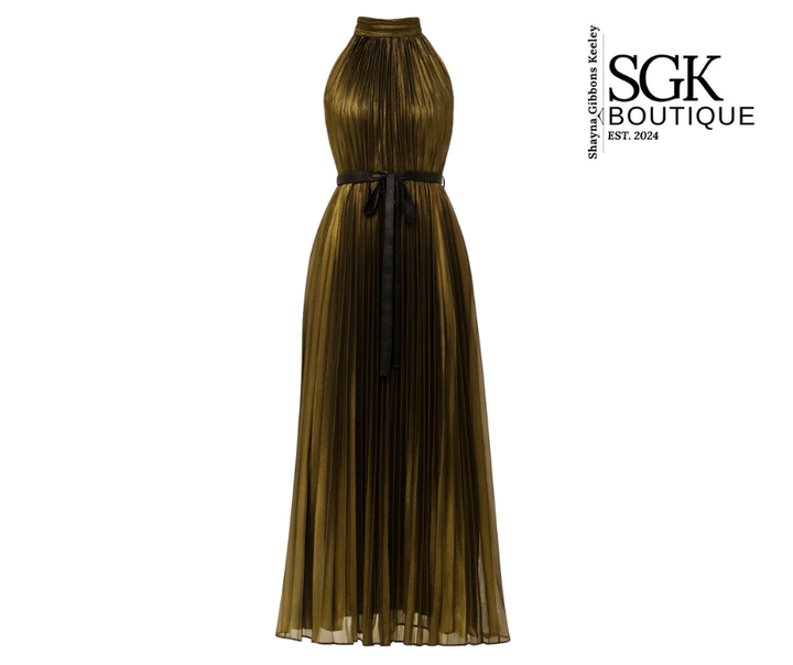 Gold pleated dress with a black ribbon on a white background, featuring SGK Boutique logo.