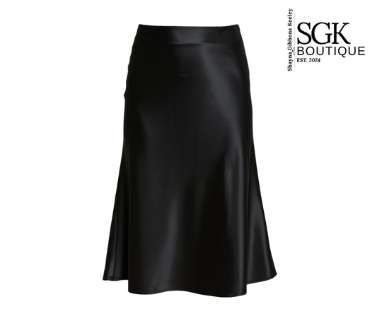 Black satin skirt on a white background with SGK Boutique logo.