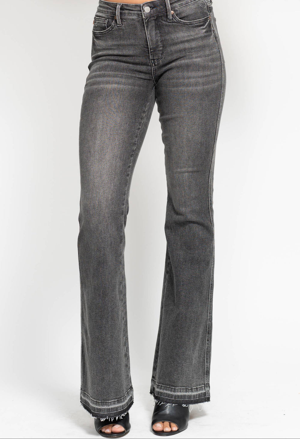 Gray flared jeans on a white background