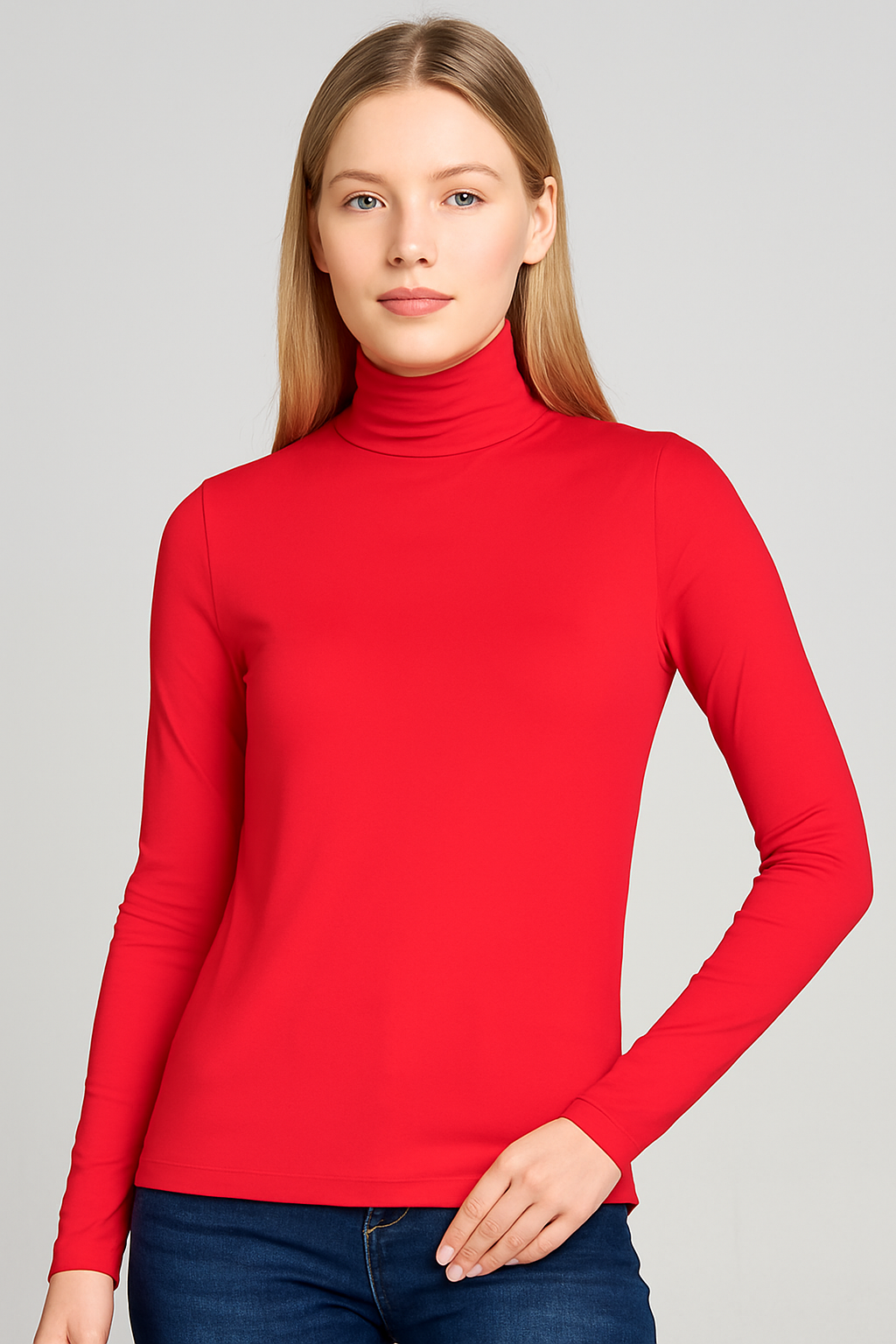Woman wearing a red turtleneck sweater against a gray background