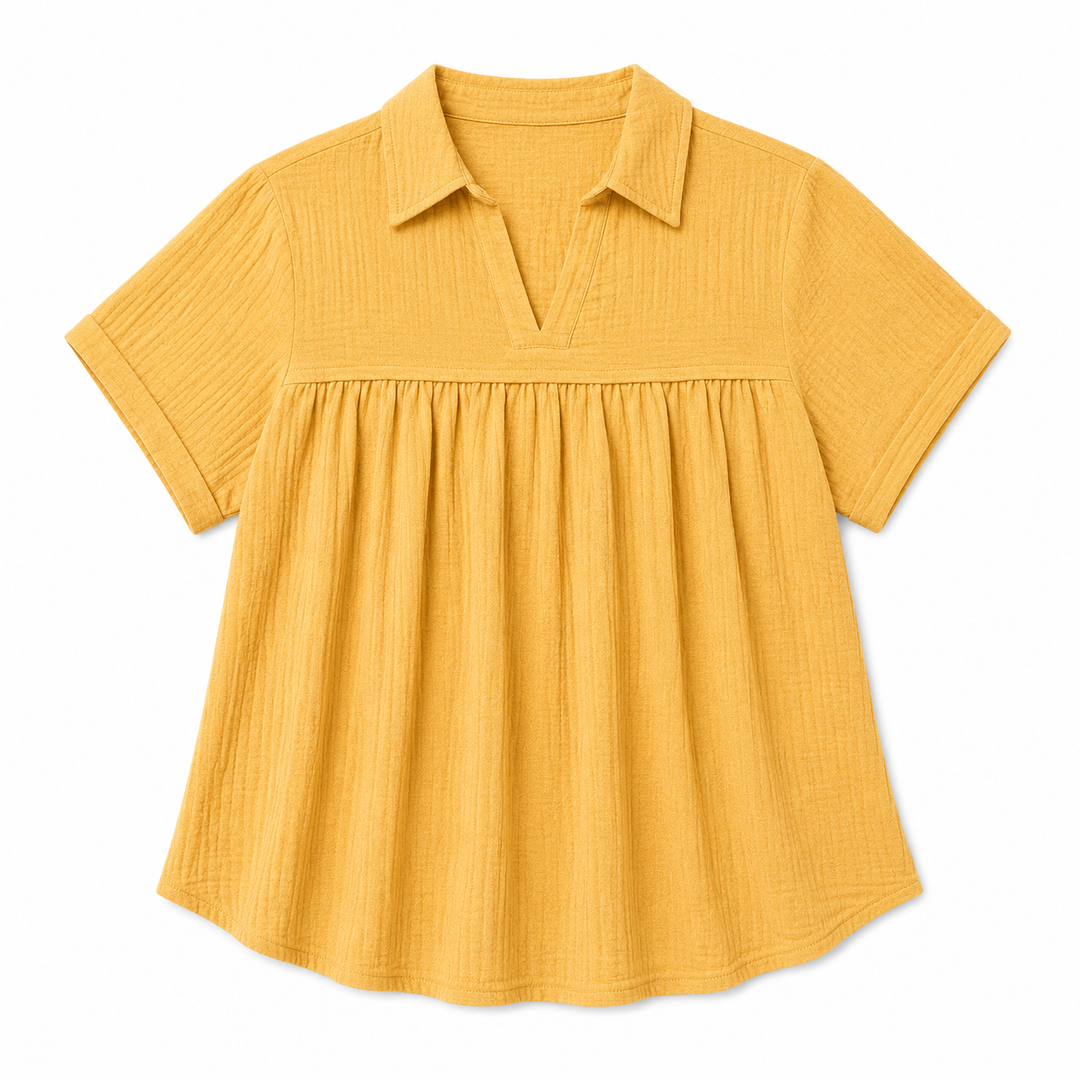 Yellow short-sleeve blouse on a white background
