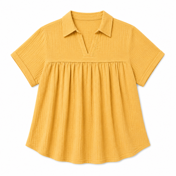 Yellow short-sleeve blouse on a white background