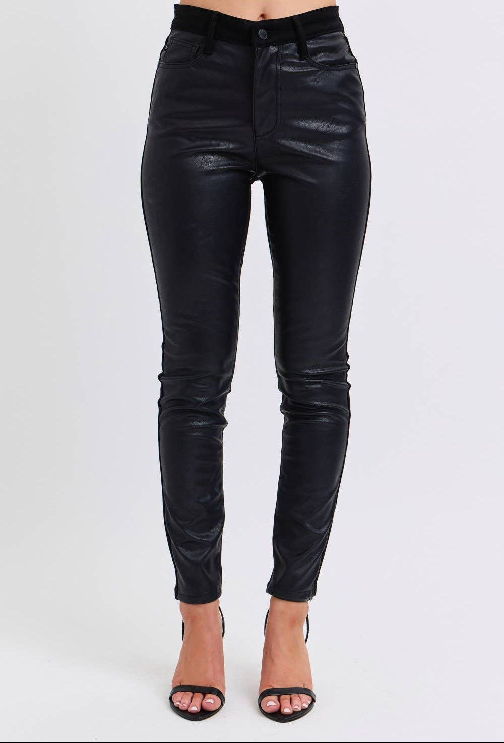 Black leather pants on a white background