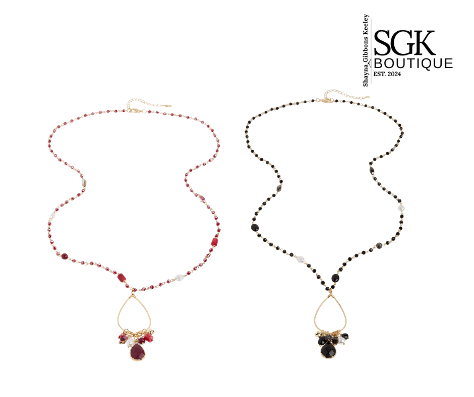 Two necklaces with red and black beads on a white background, featuring the SGK Boutique logo.