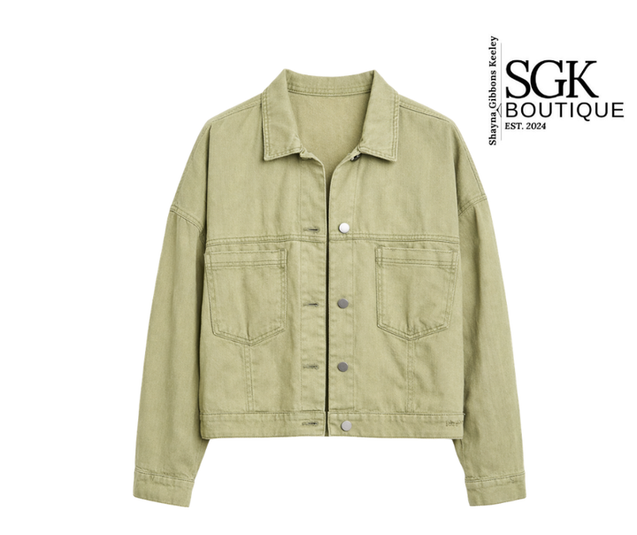 Green denim jacket on a white background with SGK Boutique logo.