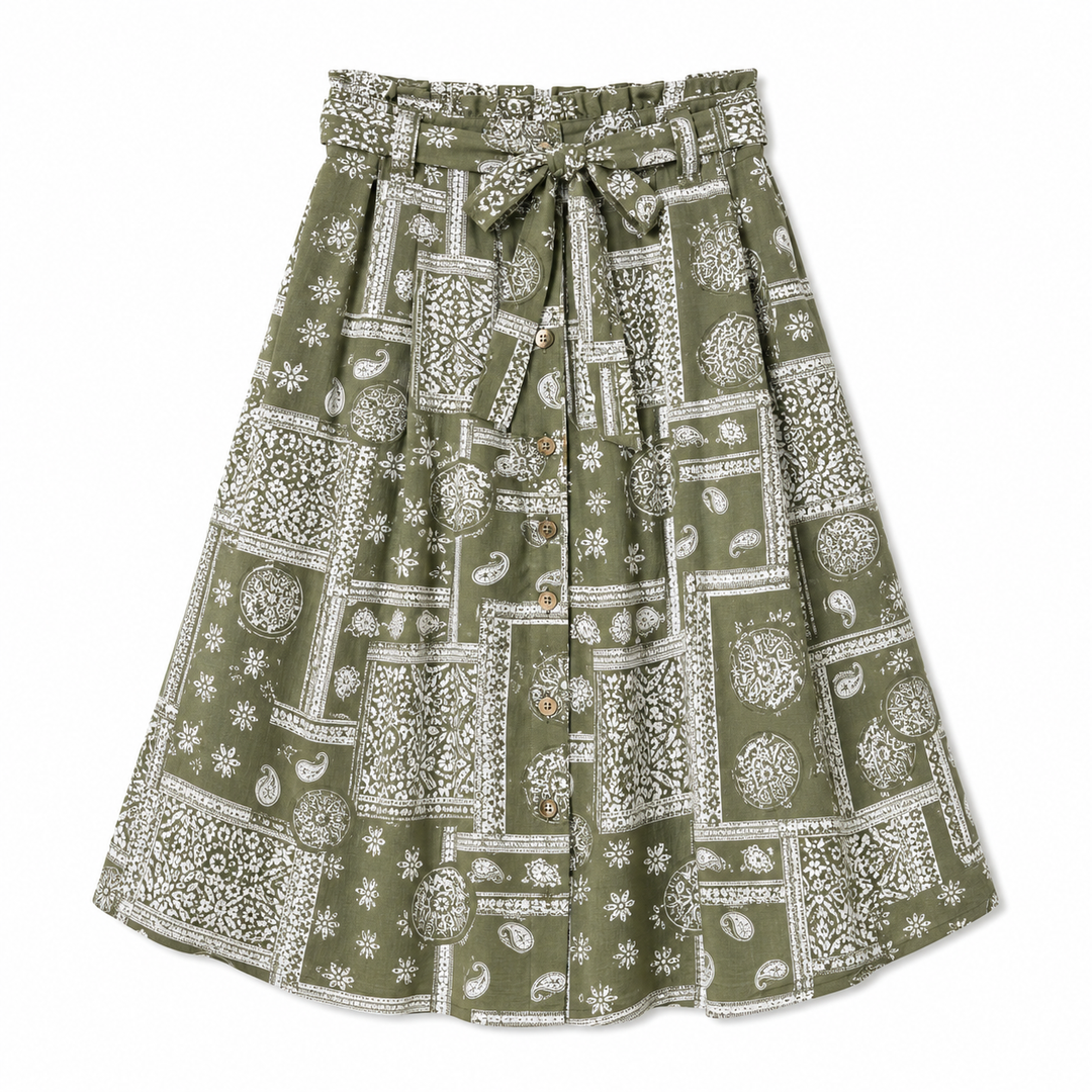 Green skirt with white pattern on a white background
