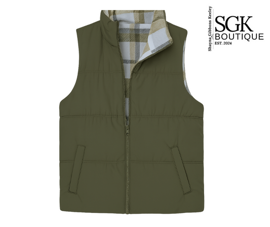 Green puffer vest with plaid lining on a white background, featuring SGK Boutique logo.
