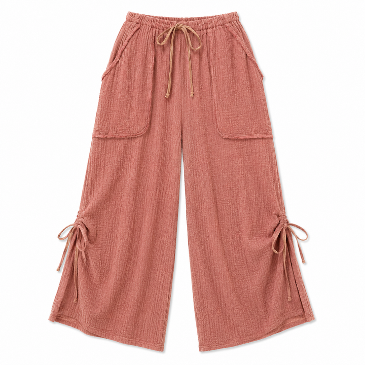 Pink wide-leg pants with drawstring waist on a white background