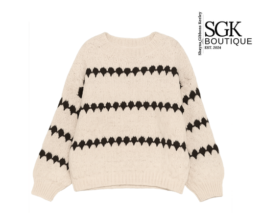 Ivory sweater with black pattern on a white background, featuring SGK Boutique logo.