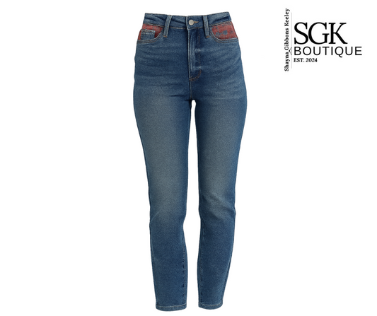 Blue jeans on a white background with SGK Boutique logo.