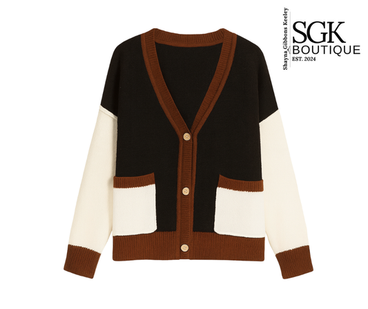 Color-blocked cardigan with brown, white, and black design on a white background, featuring SGK Boutique logo.