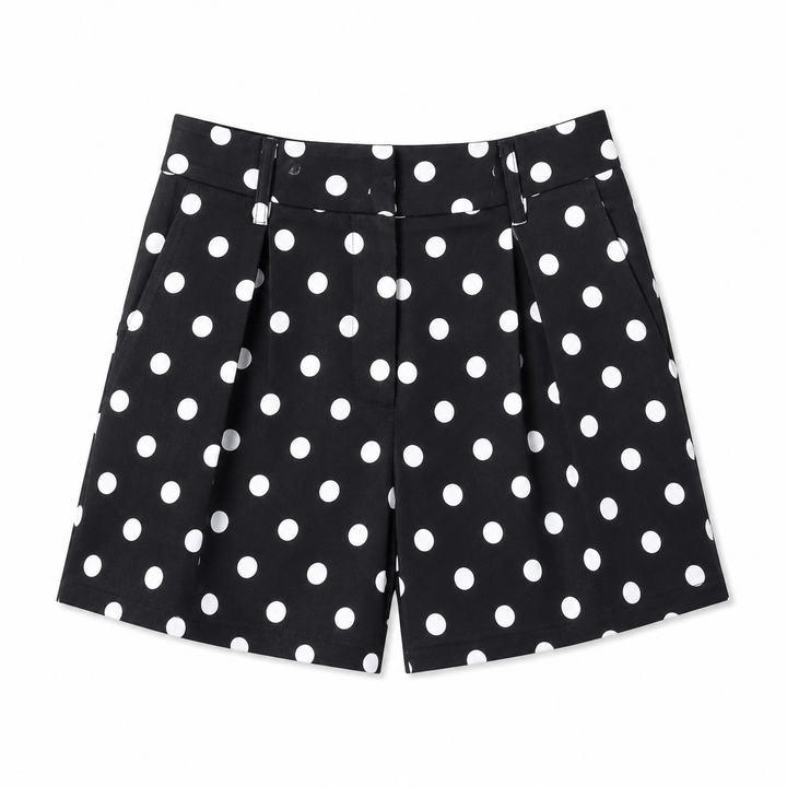 Black shorts with white polka dots on a white background