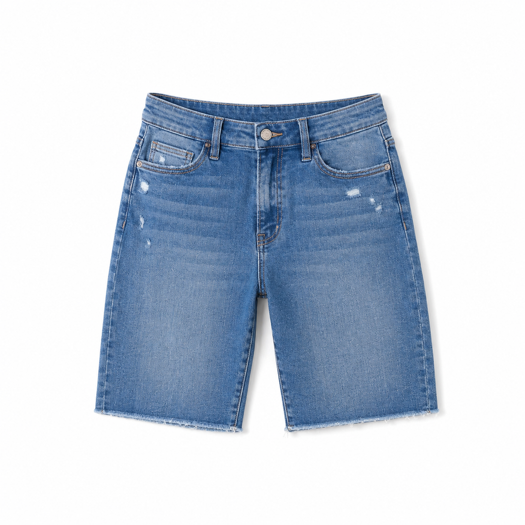 Blue denim shorts on a white background