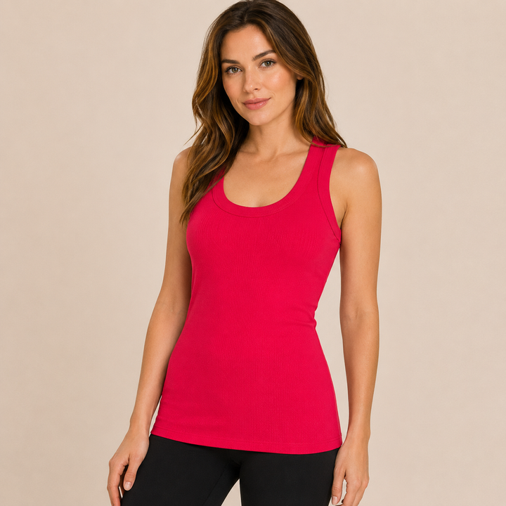 Woman wearing a red tank top against a beige background