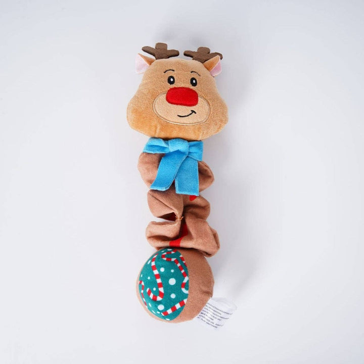 Plush reindeer toy with a blue bow on a white background