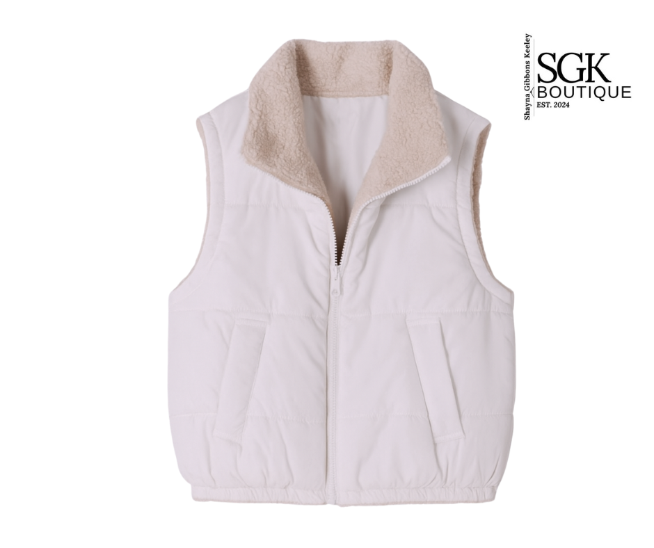 White puffer vest with beige interior on a white background, featuring SGK Boutique logo.