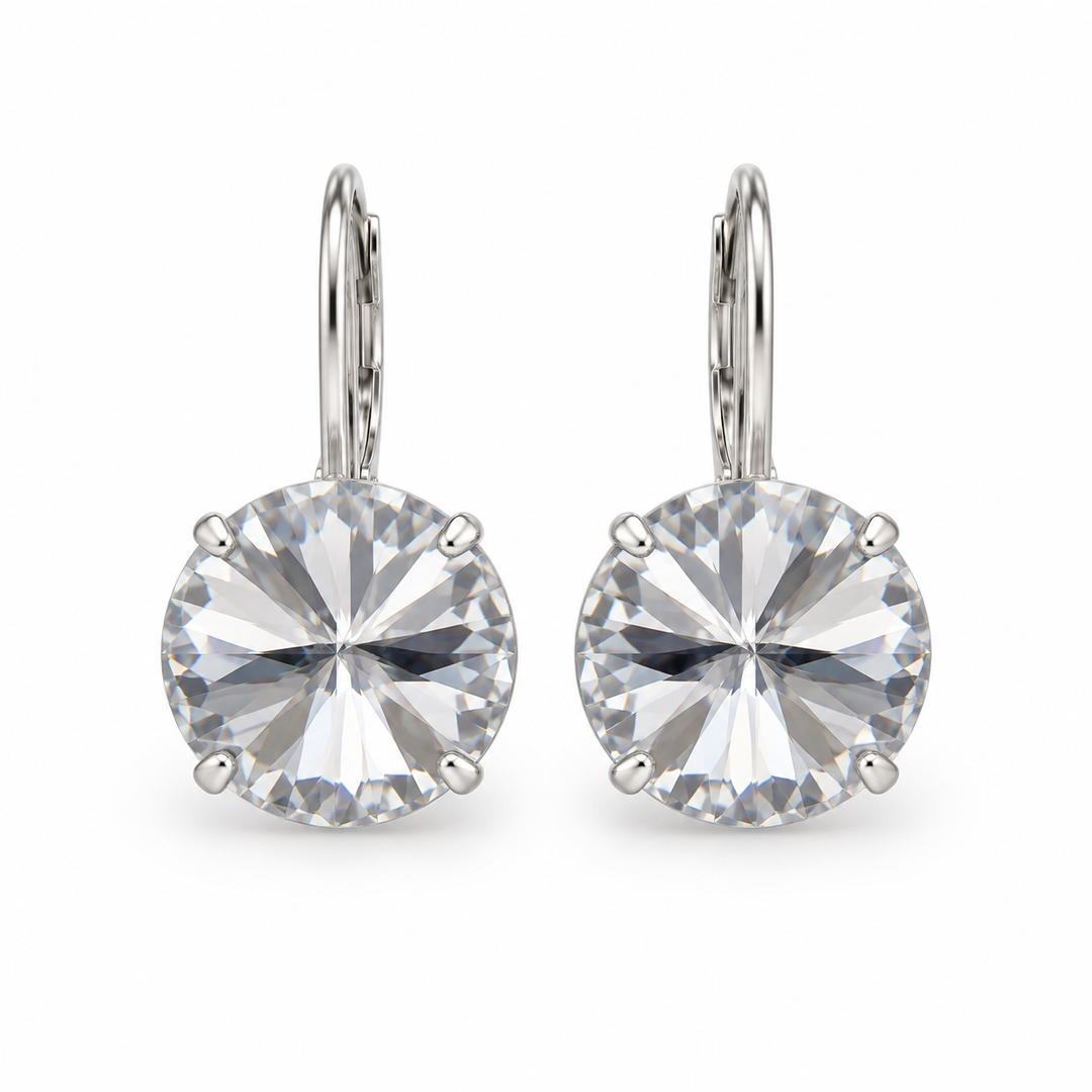 A pair of silver leverback earrings with large, round-cut clear gemstones in a four-prong setting, shown against a plain white background.