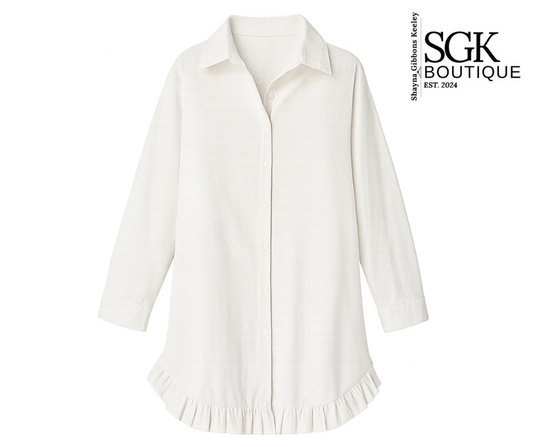 White blouse with ruffled hem on a white background, featuring SGK Boutique branding.