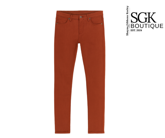 Rust jeans on a white background with SGK Boutique logo.