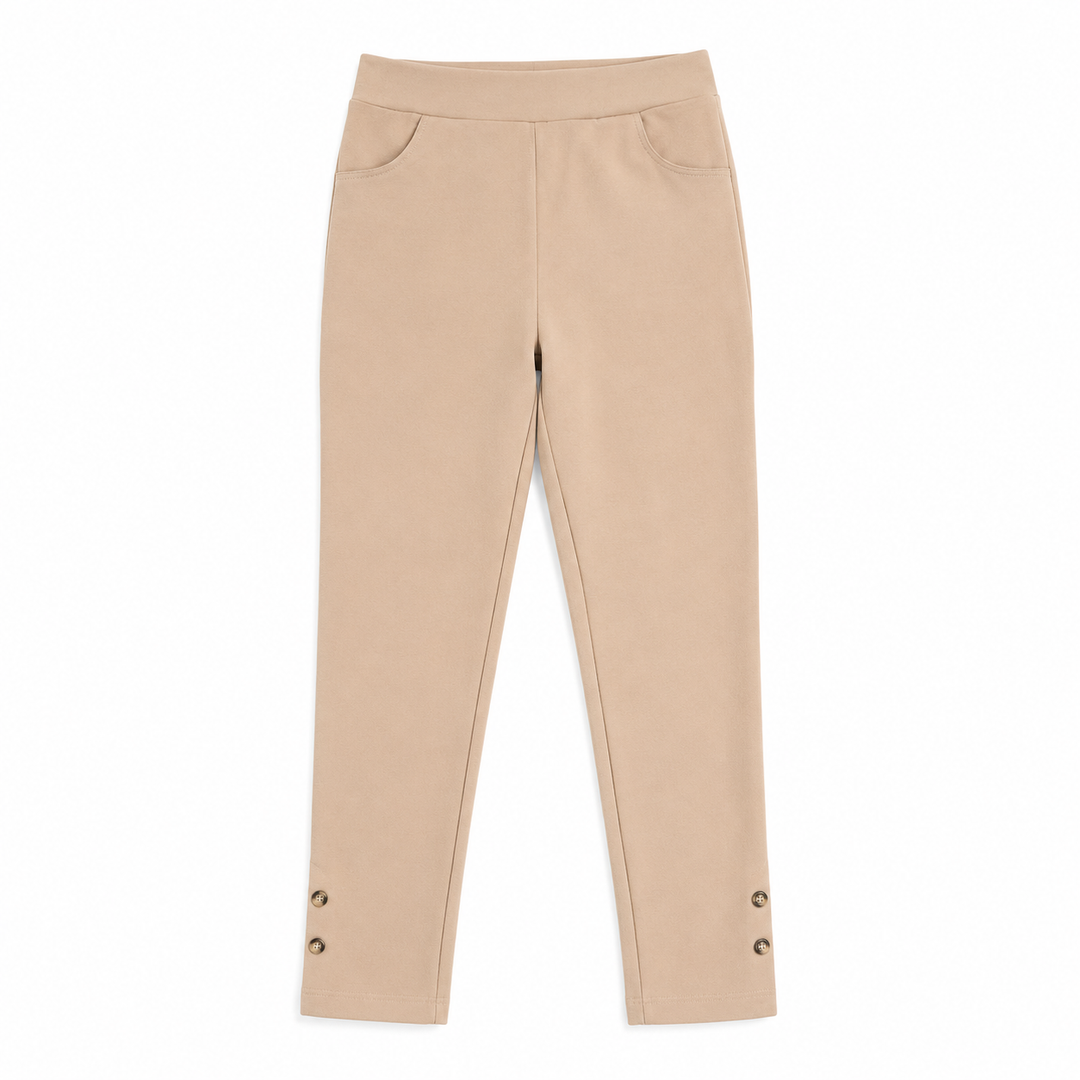 Beige pants with button details on a white background