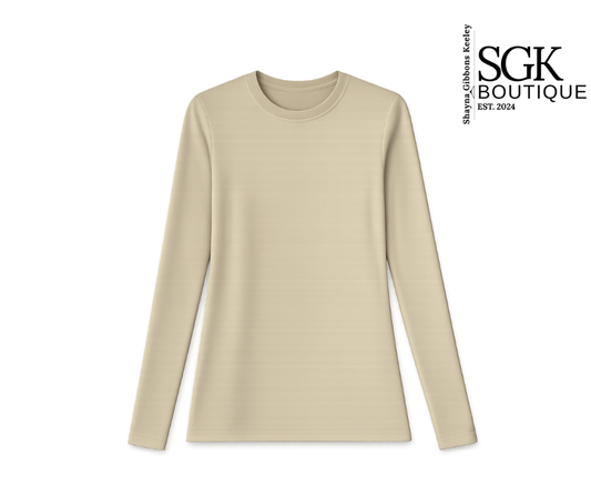 Beige long-sleeve shirt on a white background with SGK Boutique logo.