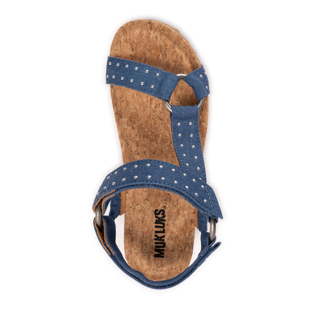 Blue sandal with cork sole on a white background
