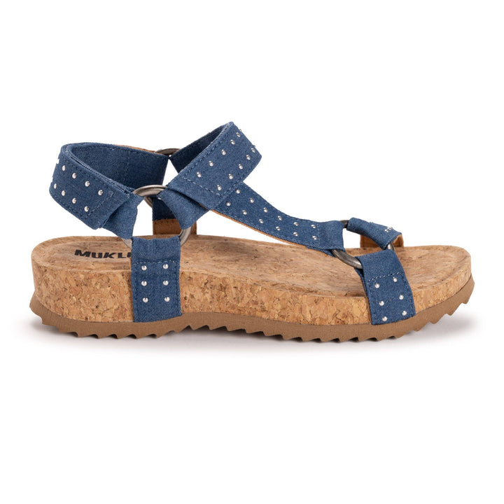 Blue sandal with cork sole on a white background