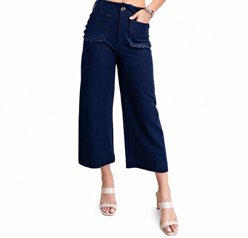Navy blue wide-leg pants worn by a person on a white background