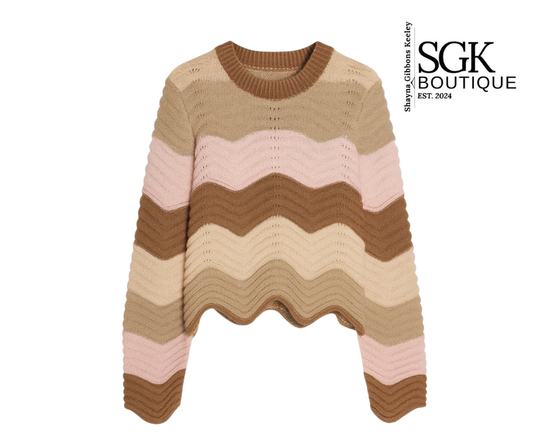 Striped sweater with wavy pattern on a white background, featuring SGK Boutique logo.