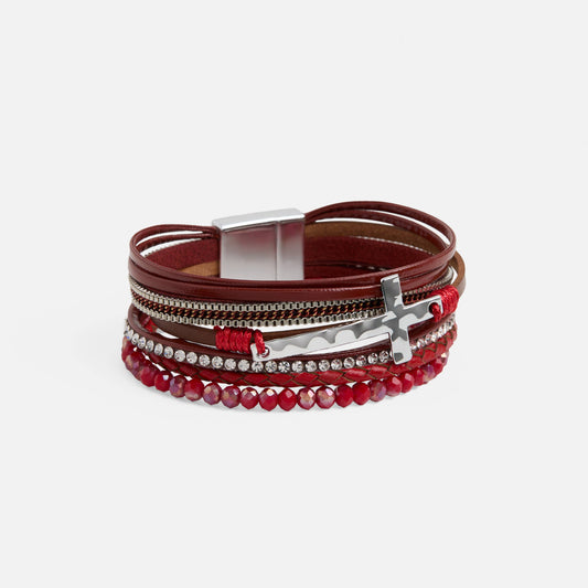 Multistrand bracelet with brown leather, red beads, and silver accents on a white background