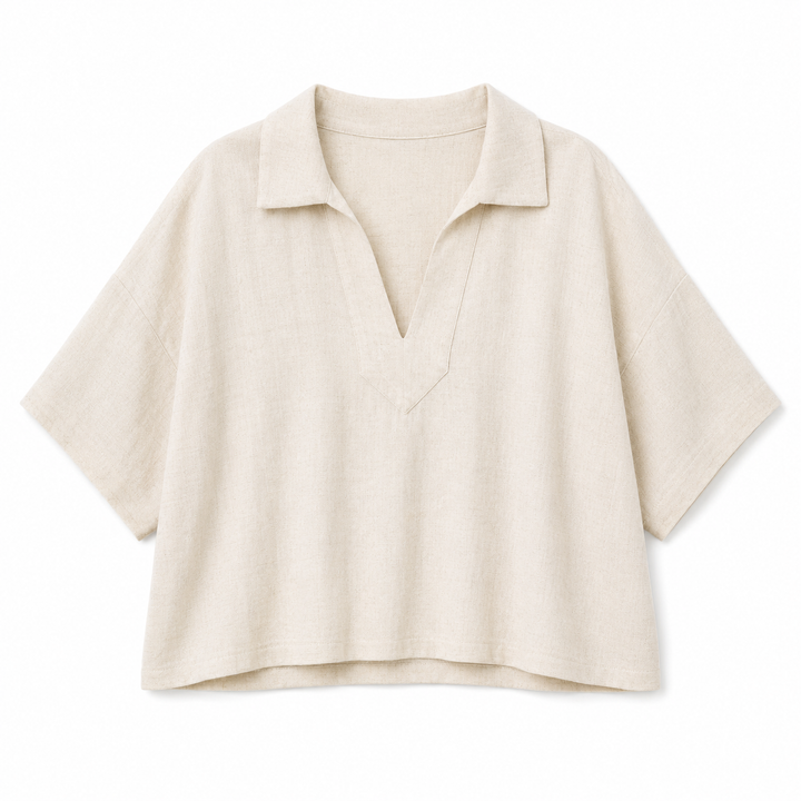 Beige short-sleeve blouse on a white background