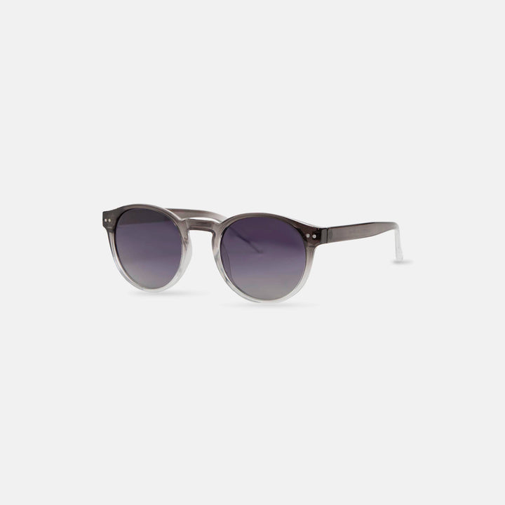 Sunglasses with gradient lenses on a white background