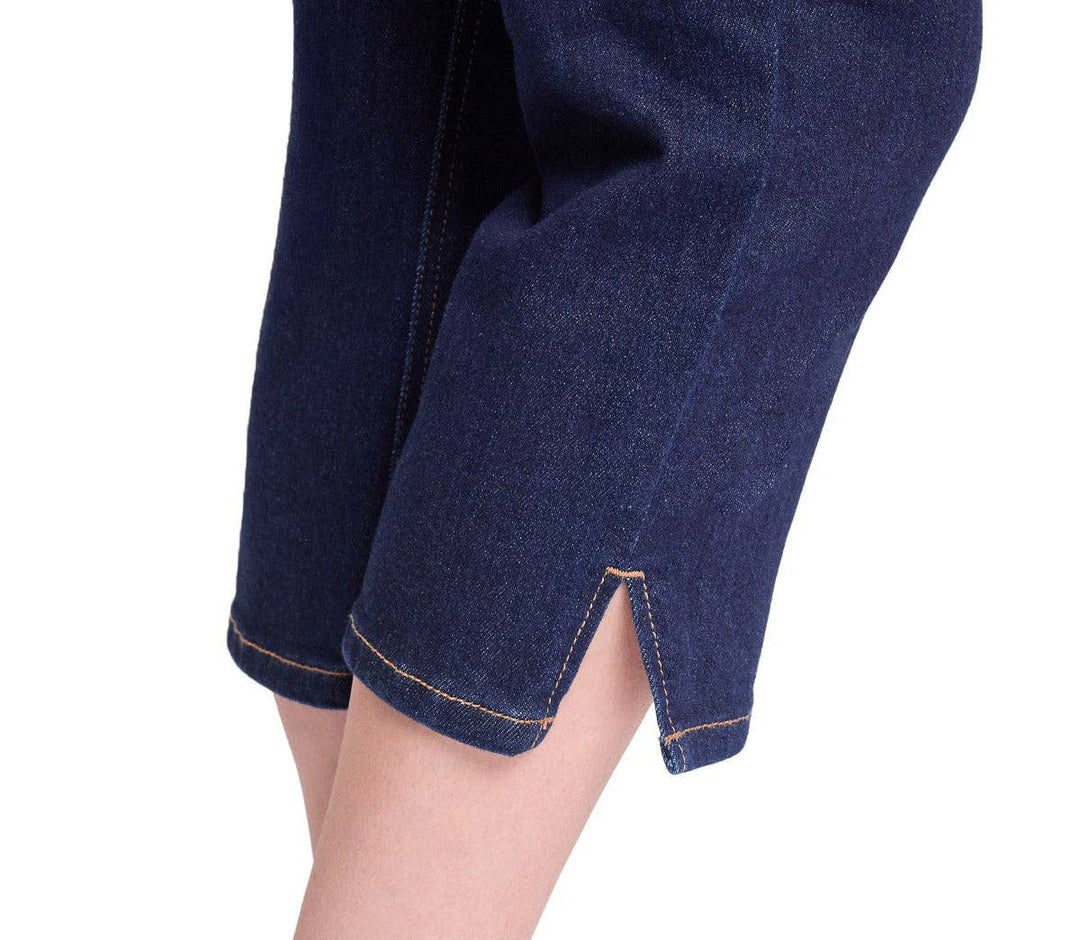 Person wearing split side Capri with a white background