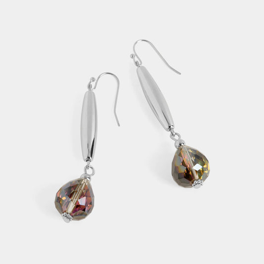 Silver earrings with teardrop-shaped gemstones on a white background