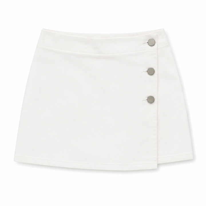 A white wrap-style mini skort with three silver-tone buttons on the front, displayed flat against a white background.