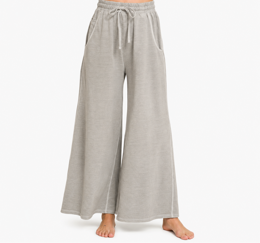 Gray wide-leg pants with a drawstring waist on a white background