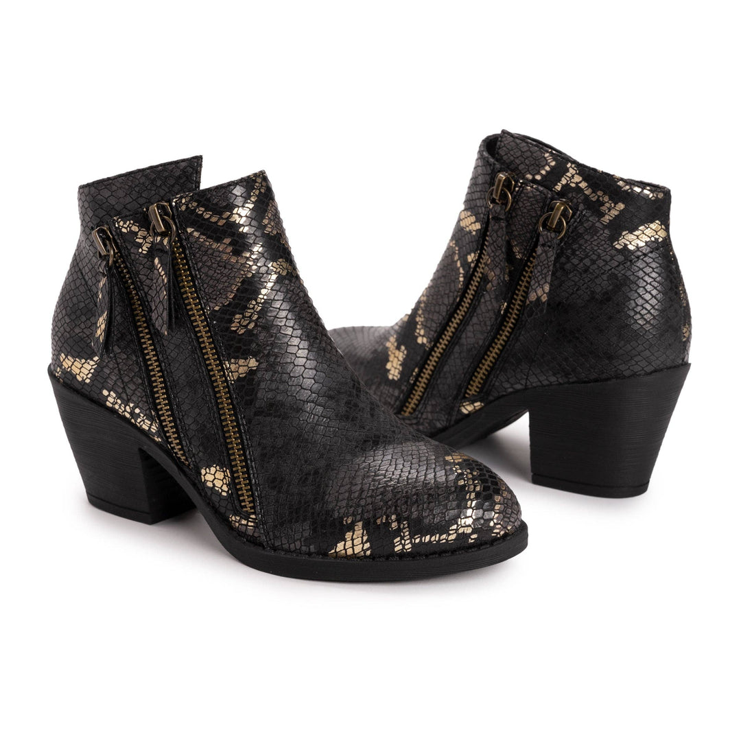 Black ankle boots with gold snake print on a white background