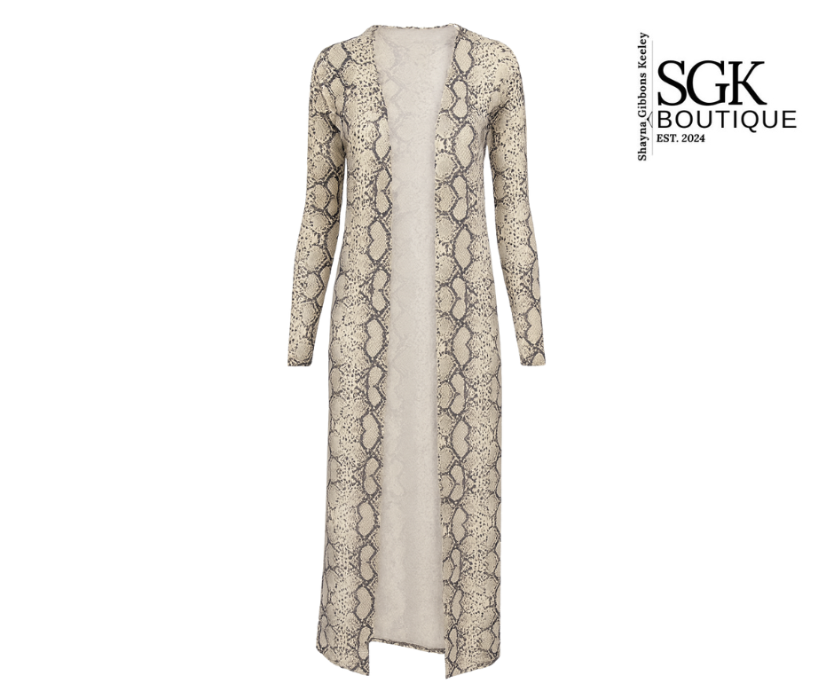 Long snake print dress on a white background with SGK Boutique logo.