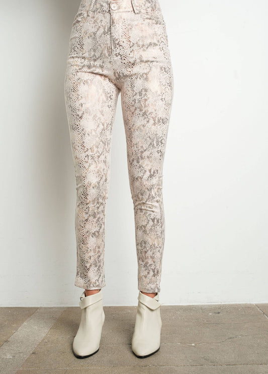 Floral-patterned pants worn by a person on a plain background