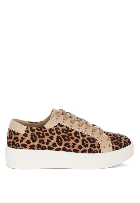 Sneaker with leopard print pattern on a white background