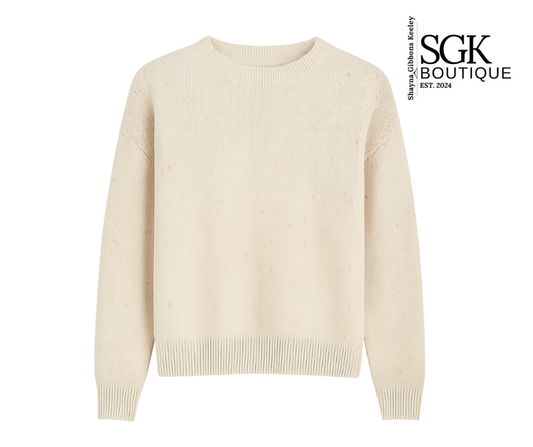 Beige sweater on a white background with SGK Boutique logo.