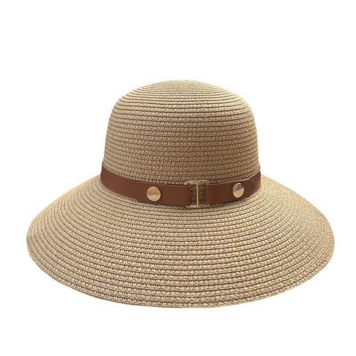 Beige straw hat with a brown band on a white background