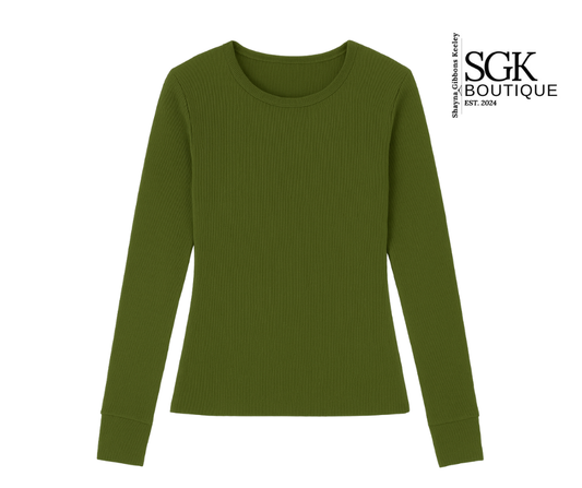 Green long-sleeve shirt on a white background with SGK Boutique logo.