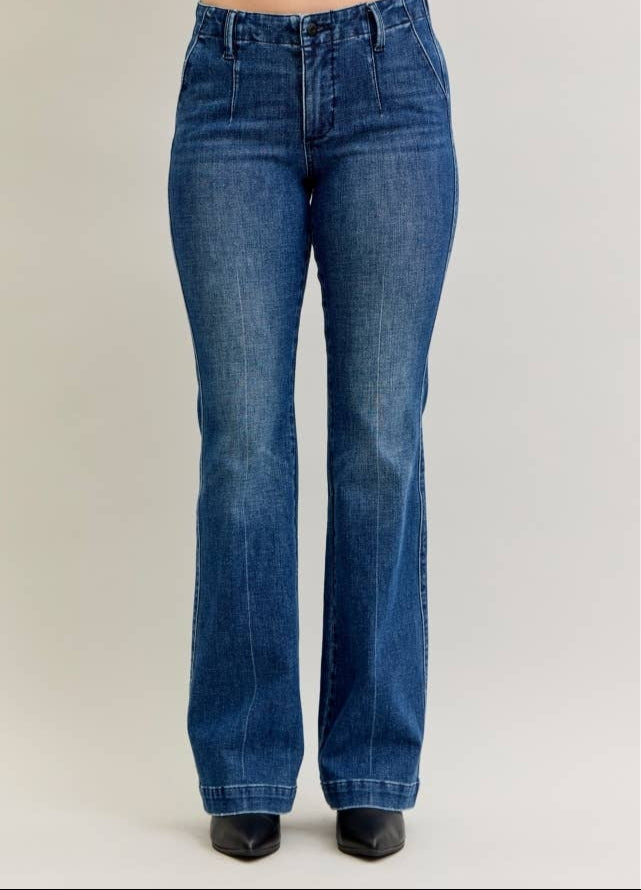 Blue jeans on a plain background