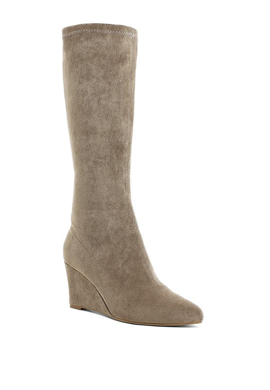 Beige knee-high wedge boot on a white background