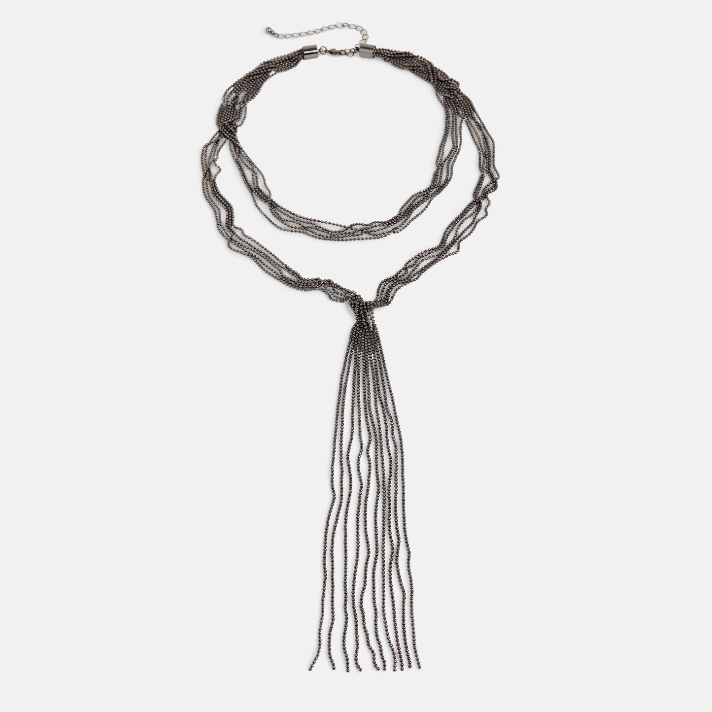 Long beaded necklace with tassel on a white background