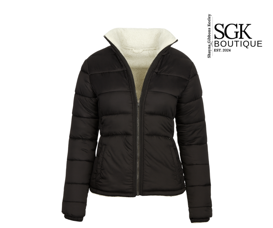 Black puffer jacket with cream lining on a white background, featuring SGK Boutique logo.
